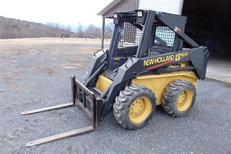 160 new holland skid steer diesel fuel in oil|ls160 new holland specs.